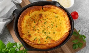 Dutch Baby de Polenta con Jamón y Queso Suizo | Receta | Qué Onda
